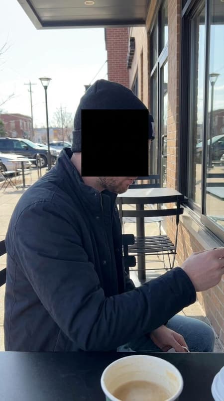 same but there is a black box over the man's face so you can't tell who he is