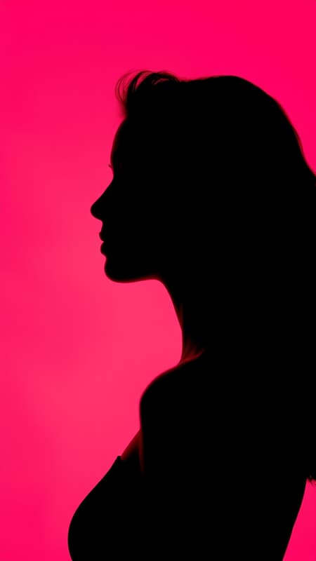 photography portrait of contrast capturing the striking profile silhouette of a woman against a vivid hot pink background utilizing a setup with a large aperture to sharply focus on the silhouette's edge maintaining color depth with a low ISO ensuring no grain ultra high definition photorealistic with an aspect ratio of 9:16 embracing subtle creative elements while adhering to a raw natural style